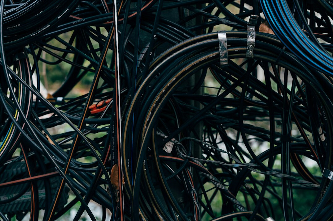 Server racks and network cables representing system integration infrastructure